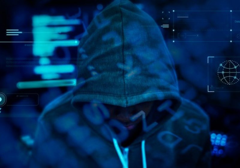 hacker-working-darkness_53876-94580